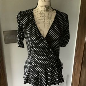 Black short sleeved polka dot wrap top